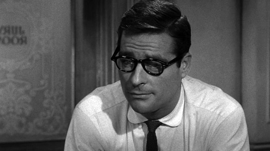 A well-groomed white guy with thick glasses wearing a shirt and tie.