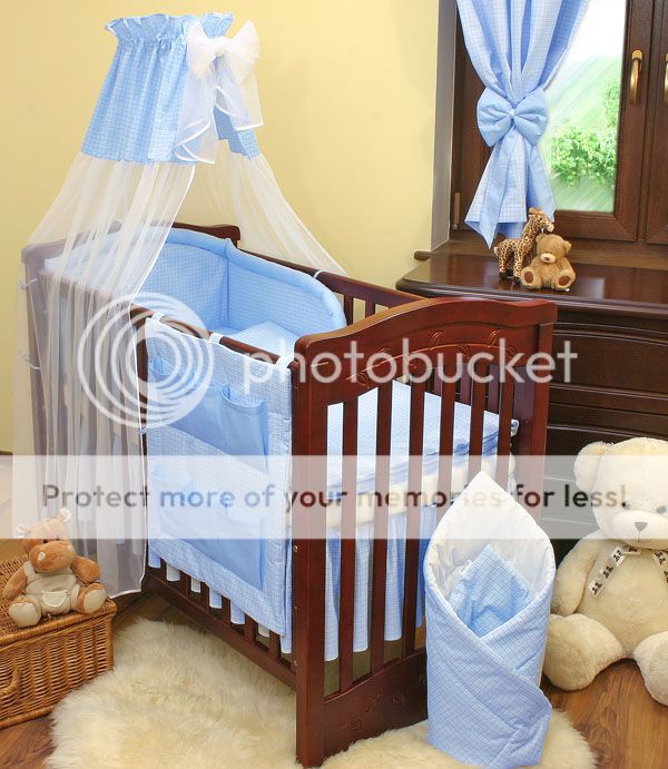 baby cots attached to bed